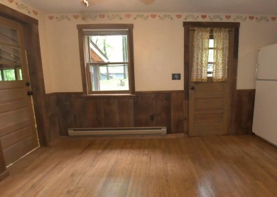 3 bedroom cabin on 4 beautiful wooded lots totaling 1.88 acres on Hide-A-Way Hills Club in Ohio - for sale on GolfHomes.com, golf home, golf lot