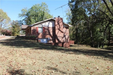 Needing large home with plenty of space?  Check out this 2 level on Harrison Country Club in Arkansas - for sale on GolfHomes.com, golf home, golf lot