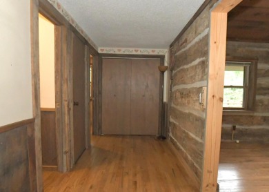 3 bedroom cabin on 4 beautiful wooded lots totaling 1.88 acres on Hide-A-Way Hills Club in Ohio - for sale on GolfHomes.com, golf home, golf lot