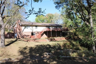 Needing large home with plenty of space?  Check out this 2 level on Harrison Country Club in Arkansas - for sale on GolfHomes.com, golf home, golf lot