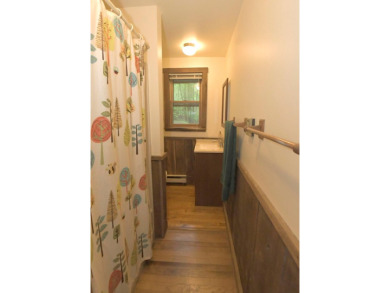 3 bedroom cabin on 4 beautiful wooded lots totaling 1.88 acres on Hide-A-Way Hills Club in Ohio - for sale on GolfHomes.com, golf home, golf lot