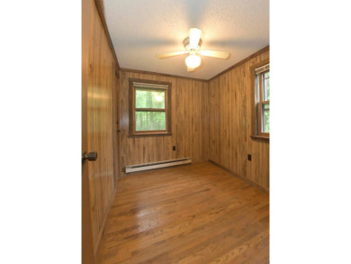 3 bedroom cabin on 4 beautiful wooded lots totaling 1.88 acres on Hide-A-Way Hills Club in Ohio - for sale on GolfHomes.com, golf home, golf lot