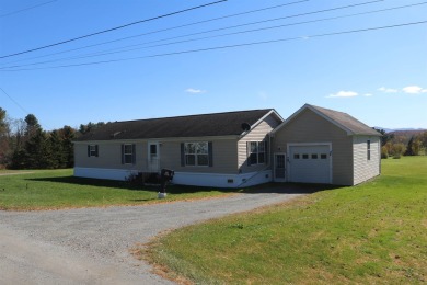 Affordable, move in ready home on the outskirts of Enosburg on Enosburg Falls Country Club in Vermont - for sale on GolfHomes.com, golf home, golf lot