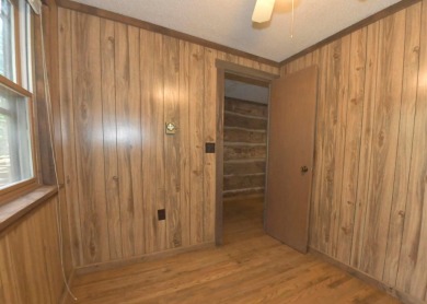 3 bedroom cabin on 4 beautiful wooded lots totaling 1.88 acres on Hide-A-Way Hills Club in Ohio - for sale on GolfHomes.com, golf home, golf lot