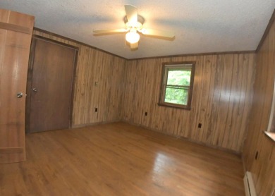 3 bedroom cabin on 4 beautiful wooded lots totaling 1.88 acres on Hide-A-Way Hills Club in Ohio - for sale on GolfHomes.com, golf home, golf lot