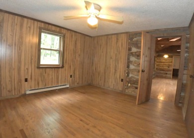 3 bedroom cabin on 4 beautiful wooded lots totaling 1.88 acres on Hide-A-Way Hills Club in Ohio - for sale on GolfHomes.com, golf home, golf lot
