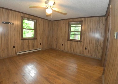 3 bedroom cabin on 4 beautiful wooded lots totaling 1.88 acres on Hide-A-Way Hills Club in Ohio - for sale on GolfHomes.com, golf home, golf lot