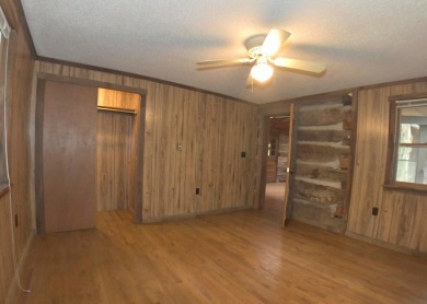 3 bedroom cabin on 4 beautiful wooded lots totaling 1.88 acres on Hide-A-Way Hills Club in Ohio - for sale on GolfHomes.com, golf home, golf lot