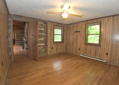 3 bedroom cabin on 4 beautiful wooded lots totaling 1.88 acres on Hide-A-Way Hills Club in Ohio - for sale on GolfHomes.com, golf home, golf lot