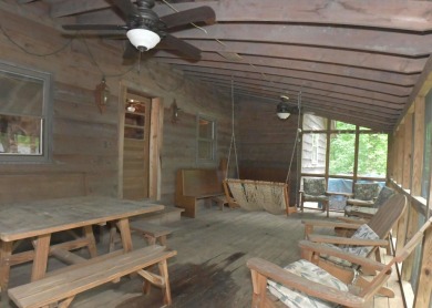 3 bedroom cabin on 4 beautiful wooded lots totaling 1.88 acres on Hide-A-Way Hills Club in Ohio - for sale on GolfHomes.com, golf home, golf lot