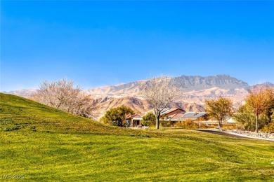 Former model home offering breathtaking golf and mountain vistas on Revere Golf Club in Nevada - for sale on GolfHomes.com, golf home, golf lot