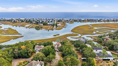 Set on a generous .44-acre homesite and positioned along one of on Pawleys Plantation Golf and Country Club in South Carolina - for sale on GolfHomes.com, golf home, golf lot