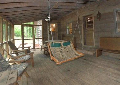 3 bedroom cabin on 4 beautiful wooded lots totaling 1.88 acres on Hide-A-Way Hills Club in Ohio - for sale on GolfHomes.com, golf home, golf lot