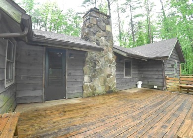 3 bedroom cabin on 4 beautiful wooded lots totaling 1.88 acres on Hide-A-Way Hills Club in Ohio - for sale on GolfHomes.com, golf home, golf lot