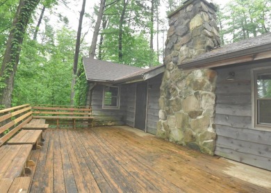 3 bedroom cabin on 4 beautiful wooded lots totaling 1.88 acres on Hide-A-Way Hills Club in Ohio - for sale on GolfHomes.com, golf home, golf lot