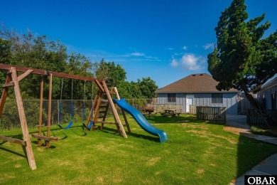 Experience coastal living at its finest in this beautifully on Seascape Golf Links in North Carolina - for sale on GolfHomes.com, golf home, golf lot