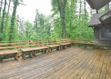 3 bedroom cabin on 4 beautiful wooded lots totaling 1.88 acres on Hide-A-Way Hills Club in Ohio - for sale on GolfHomes.com, golf home, golf lot