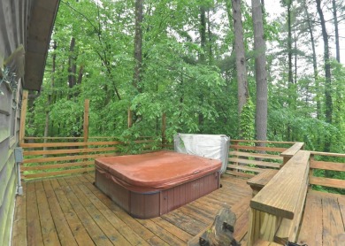 3 bedroom cabin on 4 beautiful wooded lots totaling 1.88 acres on Hide-A-Way Hills Club in Ohio - for sale on GolfHomes.com, golf home, golf lot