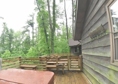 3 bedroom cabin on 4 beautiful wooded lots totaling 1.88 acres on Hide-A-Way Hills Club in Ohio - for sale on GolfHomes.com, golf home, golf lot