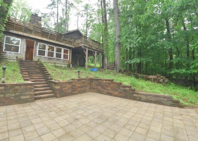 3 bedroom cabin on 4 beautiful wooded lots totaling 1.88 acres on Hide-A-Way Hills Club in Ohio - for sale on GolfHomes.com, golf home, golf lot
