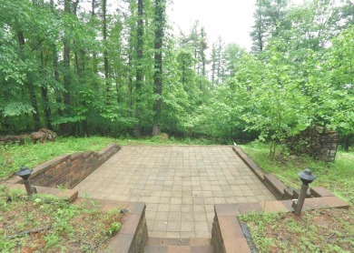 3 bedroom cabin on 4 beautiful wooded lots totaling 1.88 acres on Hide-A-Way Hills Club in Ohio - for sale on GolfHomes.com, golf home, golf lot
