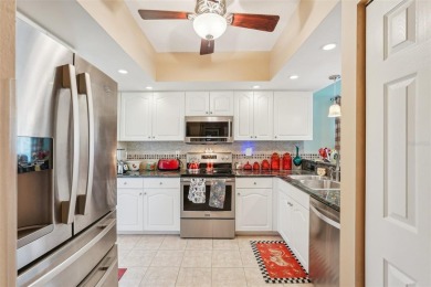 Welcome to Waterside Village! This spacious and sunny on Pelican Pointe Golf and Country Club in Florida - for sale on GolfHomes.com, golf home, golf lot