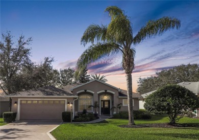 Lovely Colchester model with beautiful curb appeal! Mostly on Monarch At Royal Highlands in Florida - for sale on GolfHomes.com, golf home, golf lot