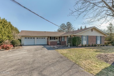 Experience refined living in this exceptional five-bedroom on Country Club of Bristol in Tennessee - for sale on GolfHomes.com, golf home, golf lot