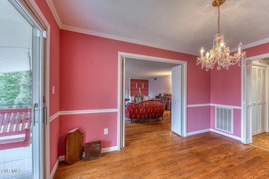 Experience refined living in this exceptional five-bedroom on Country Club of Bristol in Tennessee - for sale on GolfHomes.com, golf home, golf lot