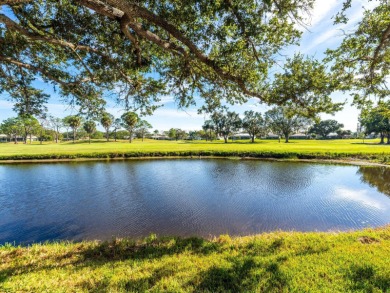 Spectacular pond framed by wide golf course views in The Meadows on The Meadows Golf and Country Club in Florida - for sale on GolfHomes.com, golf home, golf lot