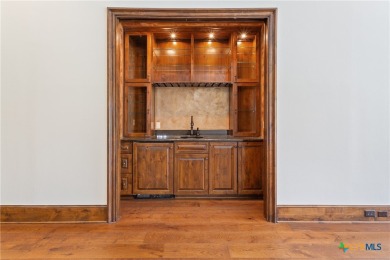 Four bedroom/four bath home with a game room overlooks Mill on Mill Creek Golf Club in Texas - for sale on GolfHomes.com, golf home, golf lot