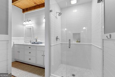 Creekside Serenity Meets Modern Luxury - Escape to this fully on Bent Tree Golf Course in Georgia - for sale on GolfHomes.com, golf home, golf lot