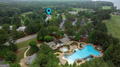 Welcome to this charming 3-bedroom, 3.5-bathroom Landing cottage on Reynolds Lake Oconee - The Landing in Georgia - for sale on GolfHomes.com, golf home, golf lot