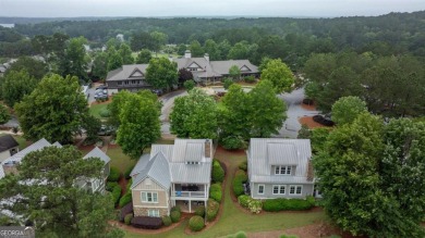 Welcome to this charming 3-bedroom, 3.5-bathroom Landing cottage on Reynolds Lake Oconee - The Landing in Georgia - for sale on GolfHomes.com, golf home, golf lot