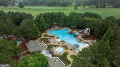 Welcome to this charming 3-bedroom, 3.5-bathroom Landing cottage on Reynolds Lake Oconee - The Landing in Georgia - for sale on GolfHomes.com, golf home, golf lot