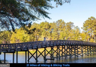Welcome to this charming 3-bedroom, 3.5-bathroom Landing cottage on Reynolds Lake Oconee - The Landing in Georgia - for sale on GolfHomes.com, golf home, golf lot