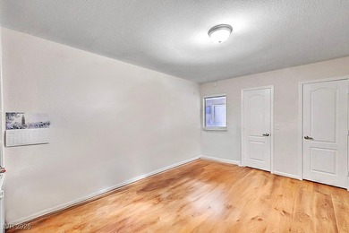 Rare first-floor corner unit on the golf course inside the on Las Vegas Country Club in Nevada - for sale on GolfHomes.com, golf home, golf lot