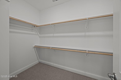 Discover this exceptional home in The Beaufort Club, a premier on North River Club in North Carolina - for sale on GolfHomes.com, golf home, golf lot