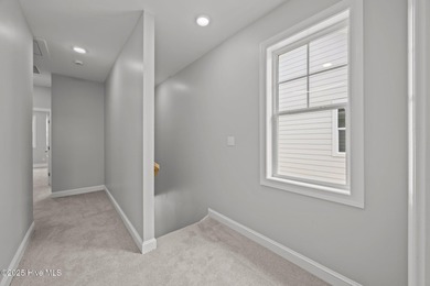 Discover this exceptional home in The Beaufort Club, a premier on North River Club in North Carolina - for sale on GolfHomes.com, golf home, golf lot