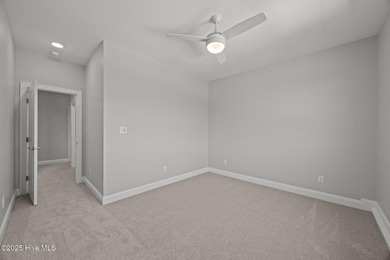 Discover this exceptional home in The Beaufort Club, a premier on North River Club in North Carolina - for sale on GolfHomes.com, golf home, golf lot