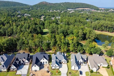 Discover elegance & luxury in this custom-built home adjacent to on Chenal Country Club - Bear Den Mountain in Arkansas - for sale on GolfHomes.com, golf home, golf lot