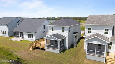Discover this exceptional home in The Beaufort Club, a premier on North River Club in North Carolina - for sale on GolfHomes.com, golf home, golf lot