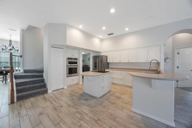 Welcome to this beautifully updated 4-bedroom, 3-bath home in on River Wilderness Golf and Country Club in Florida - for sale on GolfHomes.com, golf home, golf lot