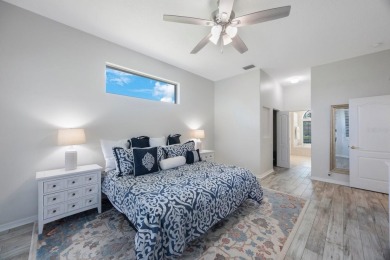 Welcome to this beautifully updated 4-bedroom, 3-bath home in on River Wilderness Golf and Country Club in Florida - for sale on GolfHomes.com, golf home, golf lot