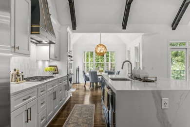 FULLY RENOVATED REYNOLDS HOME WITH PRIVATE PUTTING GREEN, RESORT on Reynolds Lake Oconee - The Oconee in Georgia - for sale on GolfHomes.com, golf home, golf lot