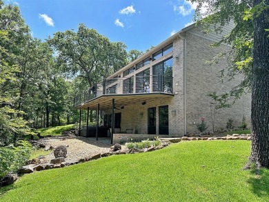 What a great find....Amazing modern beauty sitting on over an on Rock Creek Golf Club in Texas - for sale on GolfHomes.com, golf home, golf lot