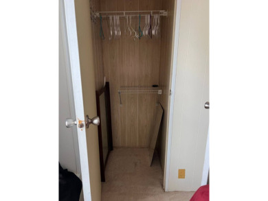 Nicely maintained furnished home on nice lot with no rear on Lake Henry Golf Club in Florida - for sale on GolfHomes.com, golf home, golf lot