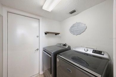 Welcome to this beautifully updated 4-bedroom, 3-bath home in on River Wilderness Golf and Country Club in Florida - for sale on GolfHomes.com, golf home, golf lot