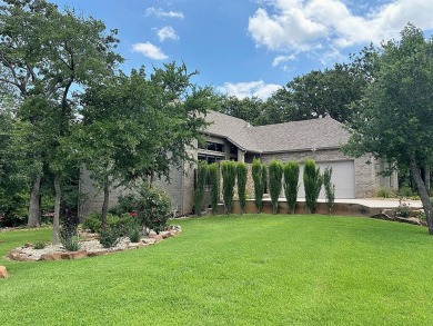 What a great find....Amazing modern beauty sitting on over an on Rock Creek Golf Club in Texas - for sale on GolfHomes.com, golf home, golf lot