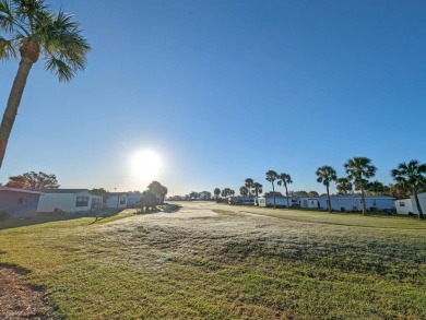 Nicely maintained furnished home on nice lot with no rear on Lake Henry Golf Club in Florida - for sale on GolfHomes.com, golf home, golf lot